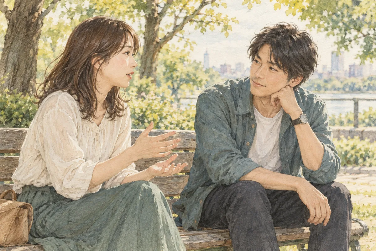 公園で恋人の話に落ち着いて耳を傾ける男性